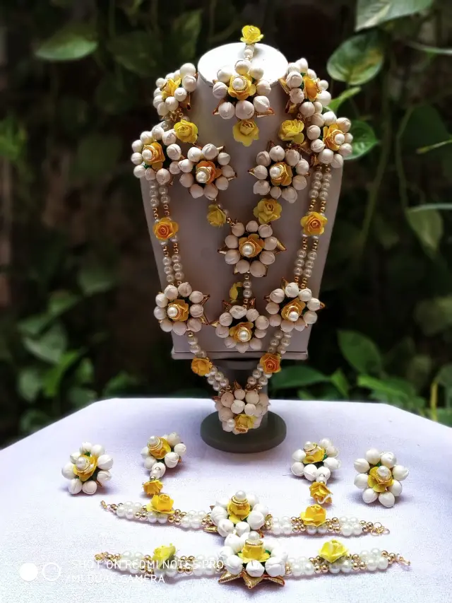 Yellow and white mogra flower jewelry